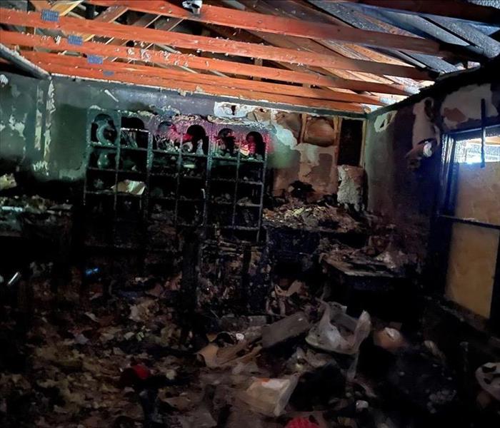 Room so damaged by fire almost completely black